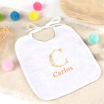 Babero personalizado Inicial Flores. Elige tu diseño