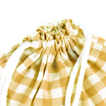 Pack Mochila y Bolsita Vichy Mostaza personalizado